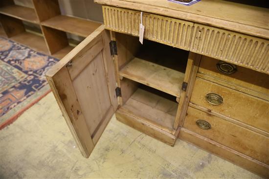 A 19th century pine inverse breakfront sideboard, W.150cm, D.58cm, H.79cm